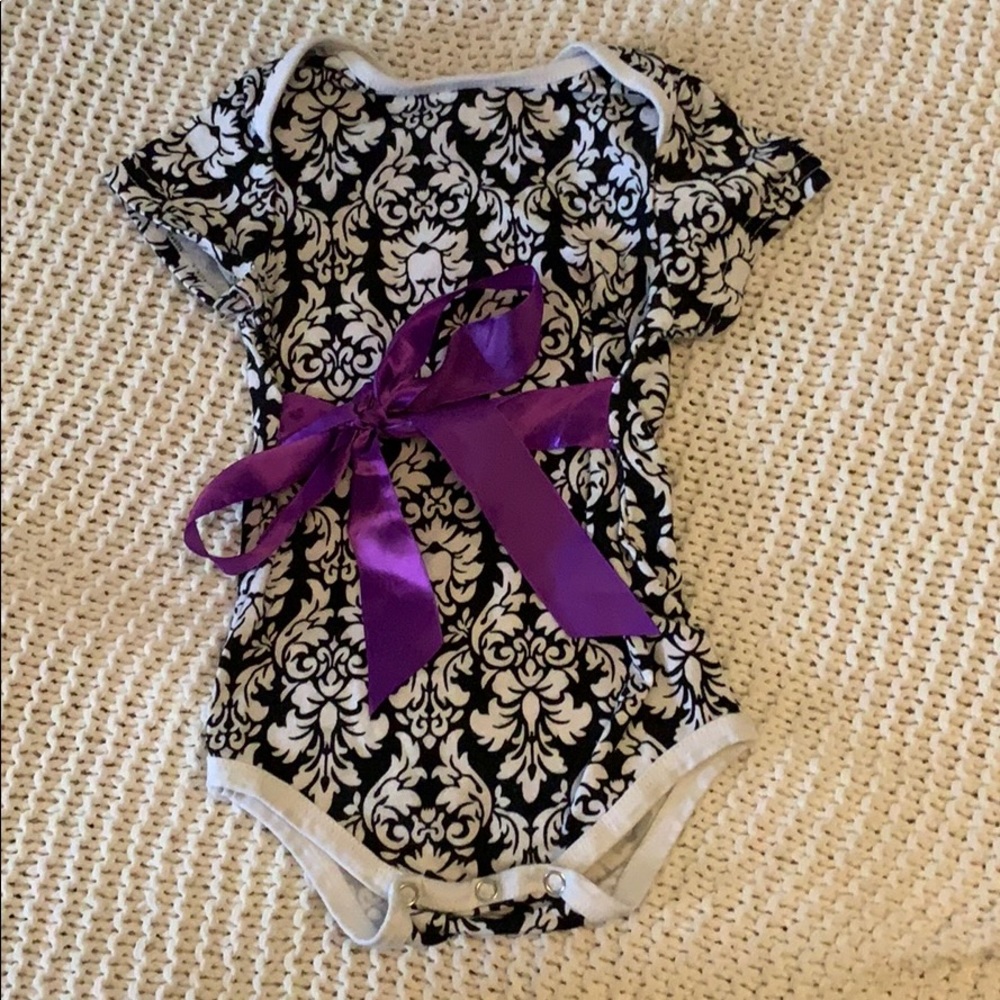 Black and white body suit